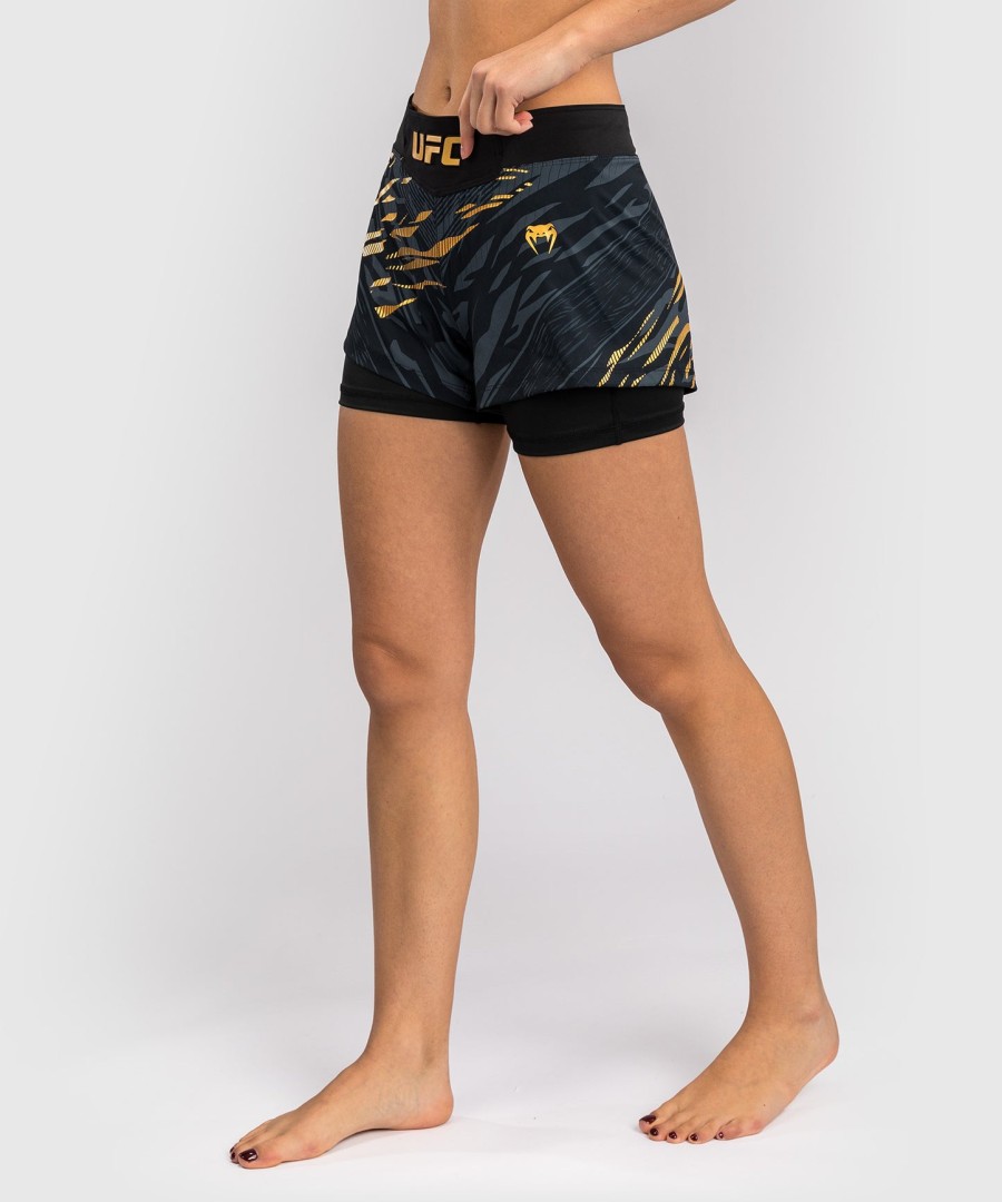 ufc fusion by venum authentic fight night short de luta feminina - campeã