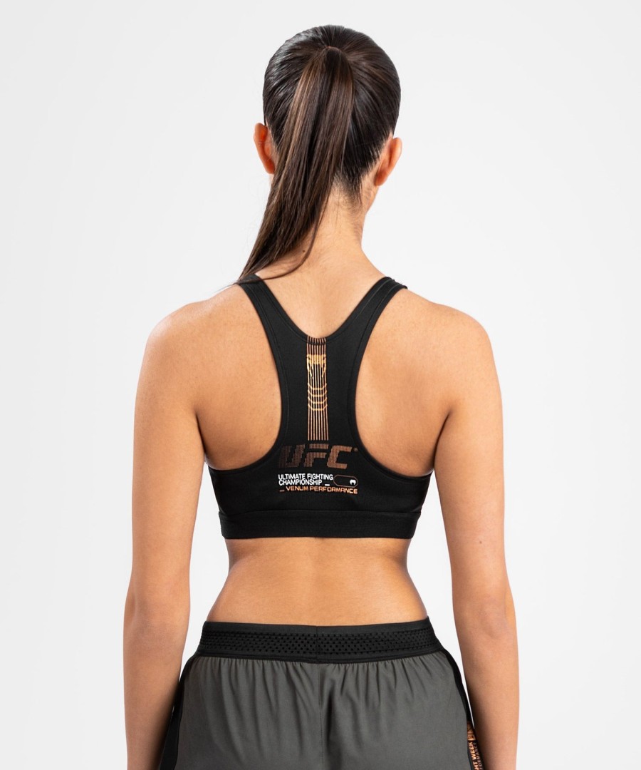 top esportivo feminino ufc adrenaline by venum fight week - cáquibronze