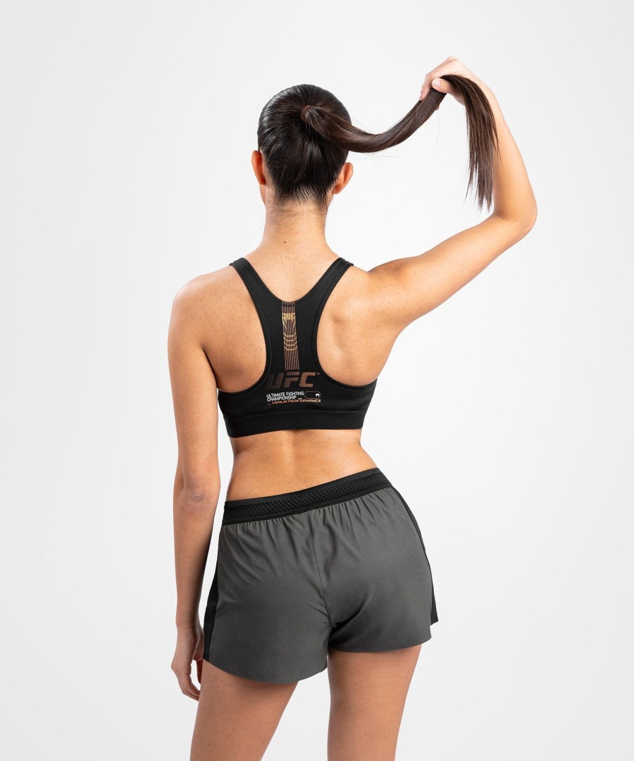 top esportivo feminino ufc adrenaline by venum fight week - cáquibronze