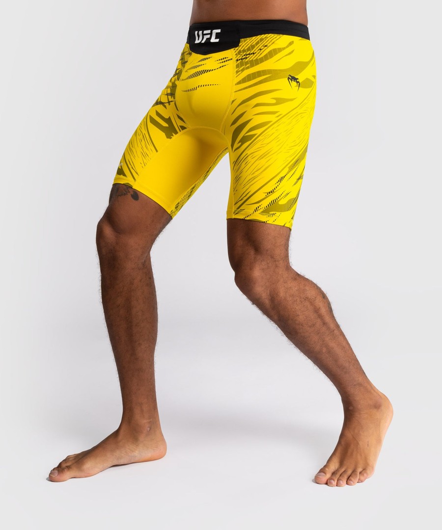 bermuda ufc fusion by venum authentic fight night masculina vale tudo - amarela