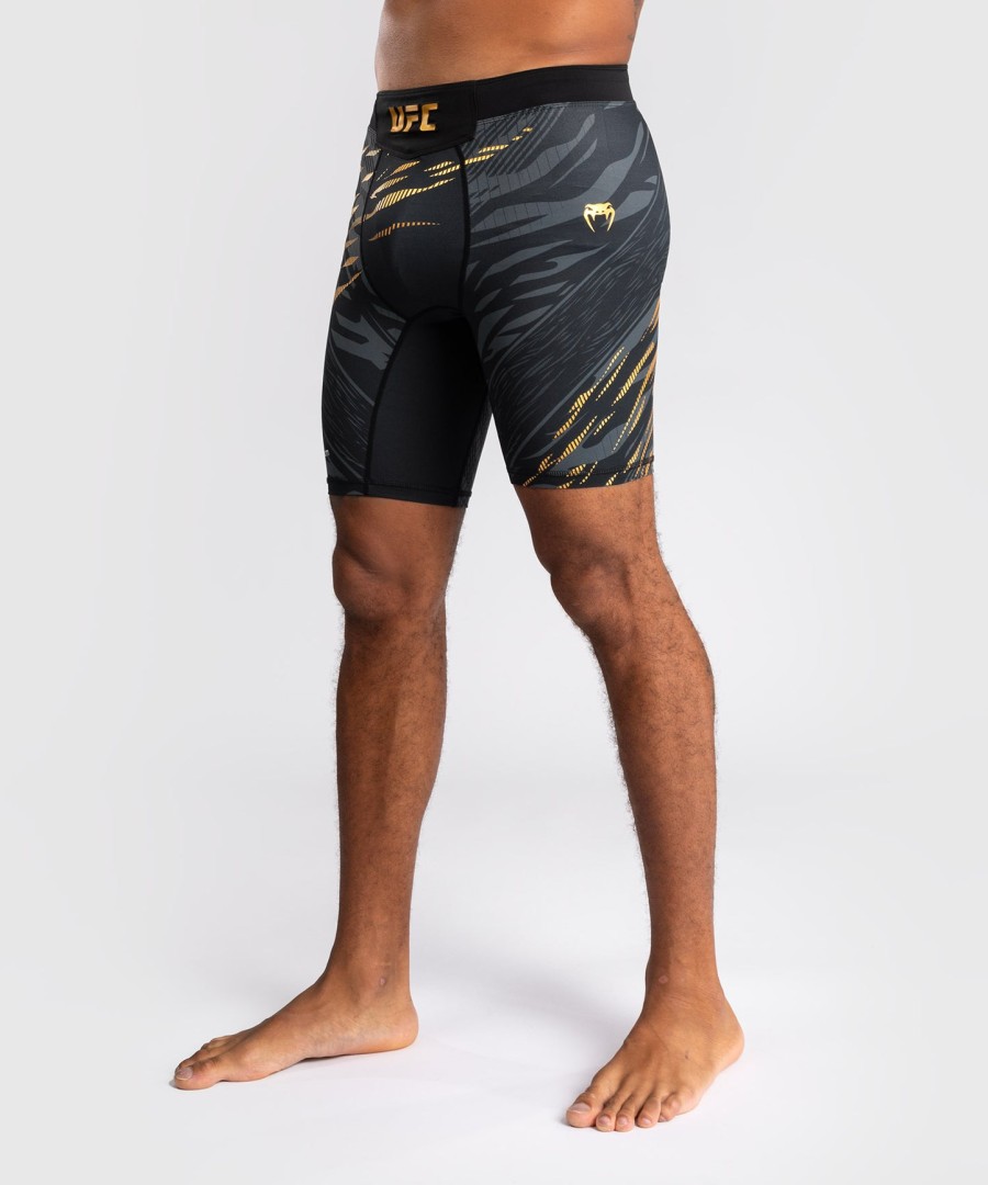ufc fusion by venum authentic fight night short masculino vale tudo - campeão