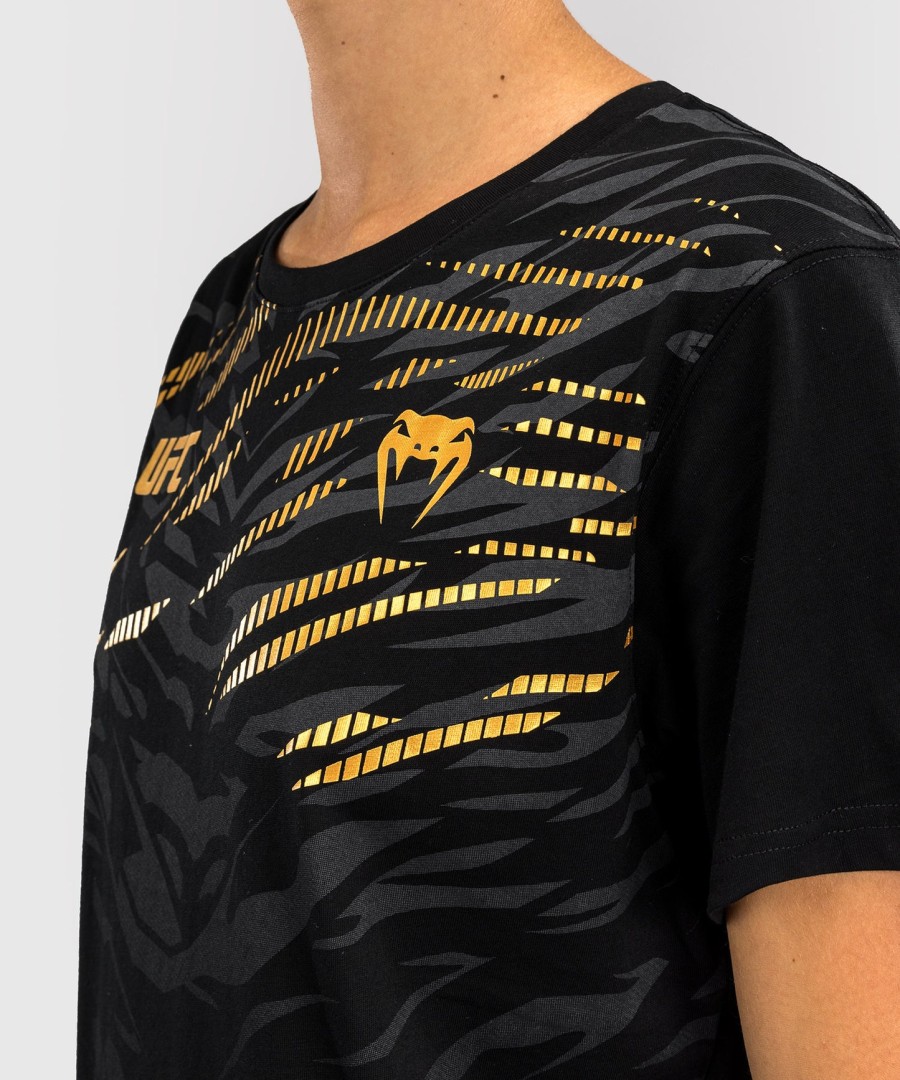 camiseta feminina de manga curta ufc fusion by venum replica - campeã