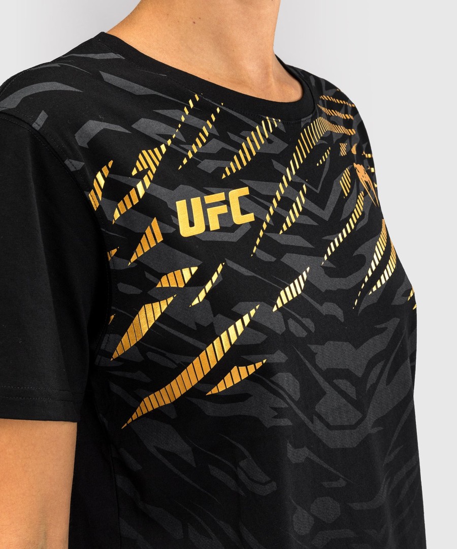 camiseta feminina de manga curta ufc fusion by venum replica - campeã