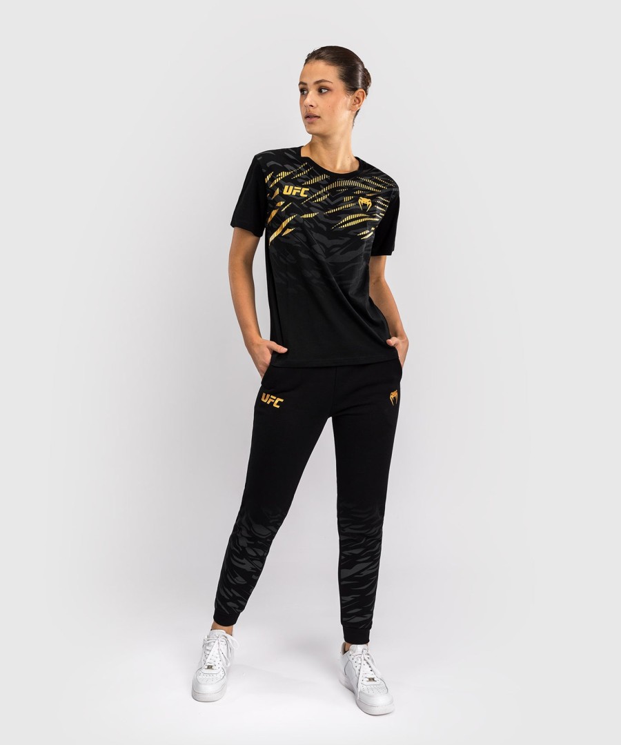 camiseta feminina de manga curta ufc fusion by venum replica - campeã