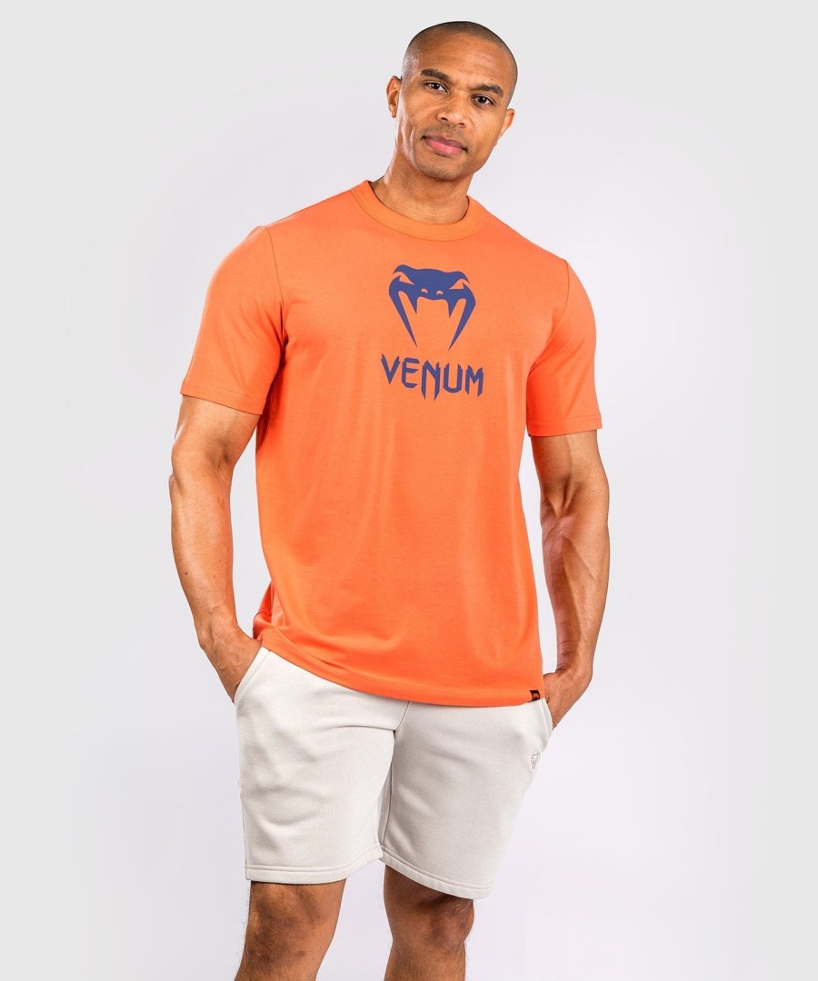 camiseta venum classic - laranjaazul marinho