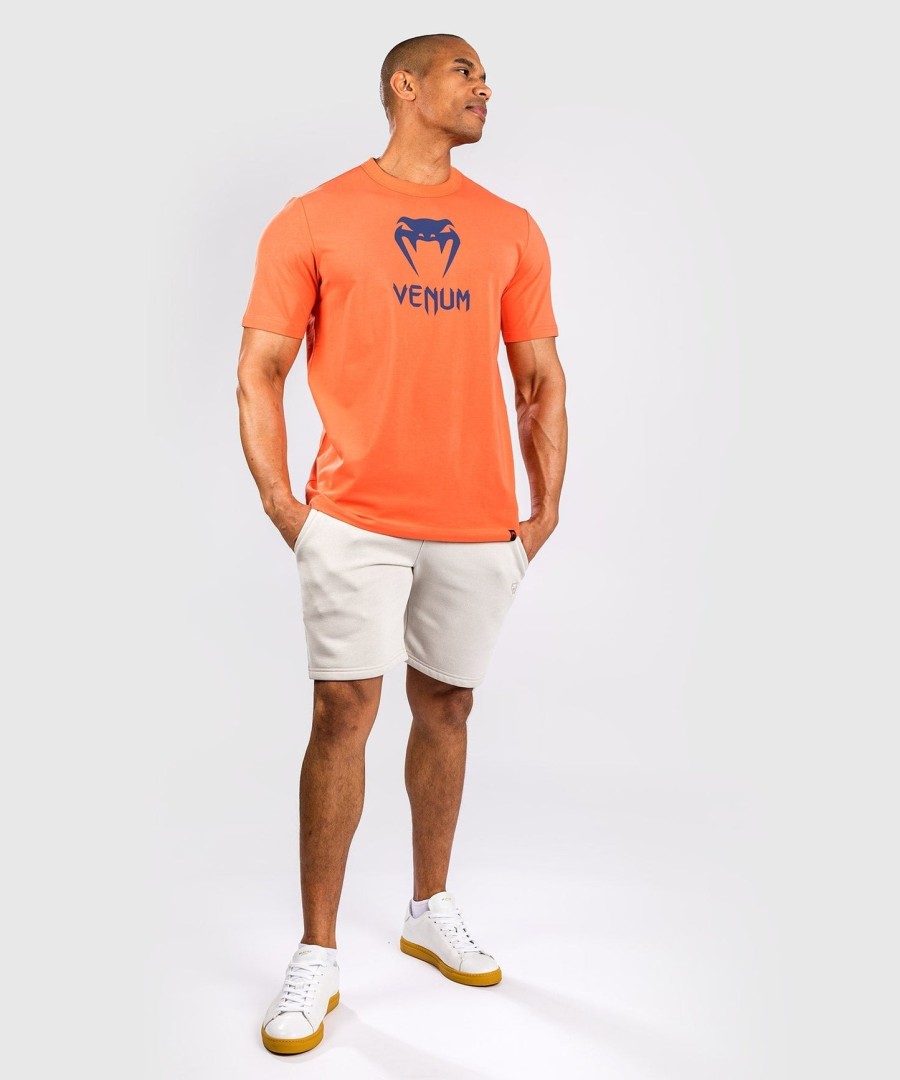 camiseta venum classic - laranjaazul marinho