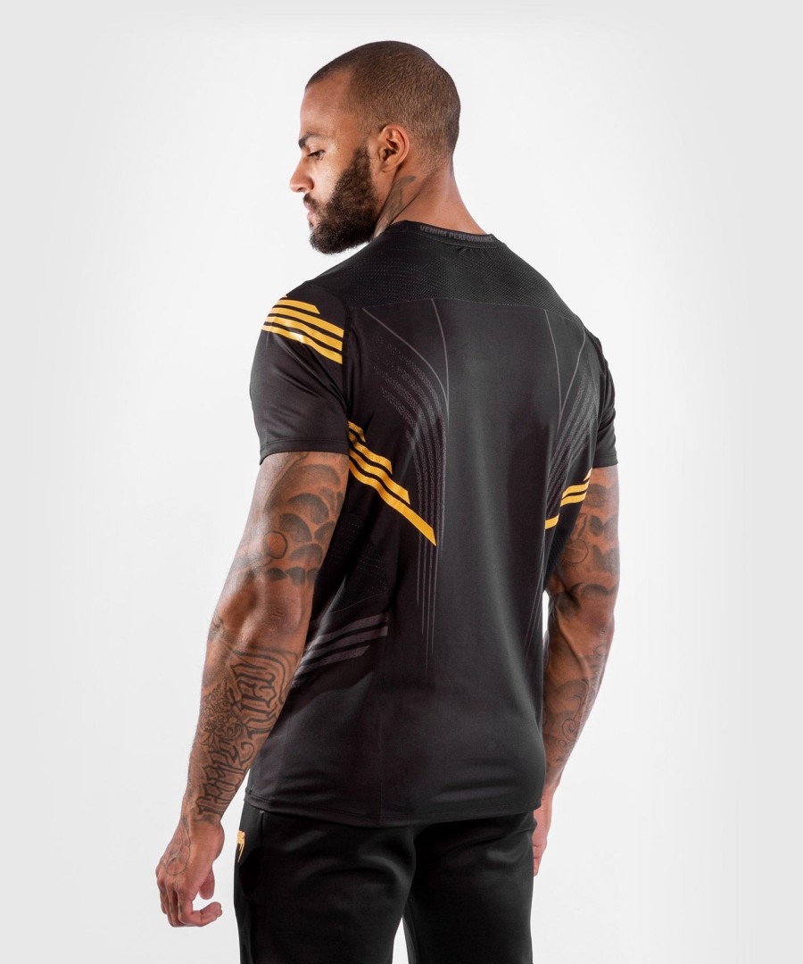 camisa de entrada autêntica do ufc venum fight night para homens - champion