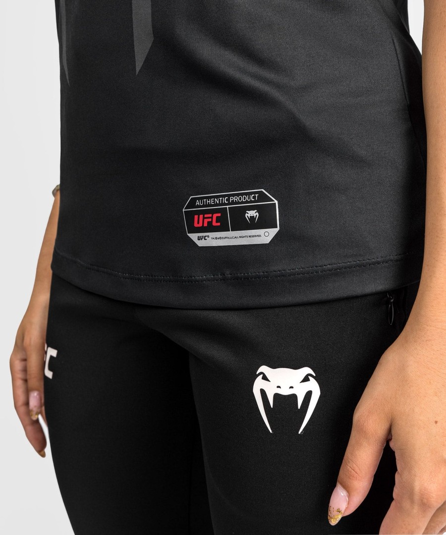 uniforme autêntico ufc venum fight night 2.0 da venum - camisa de entrada feminina - preta