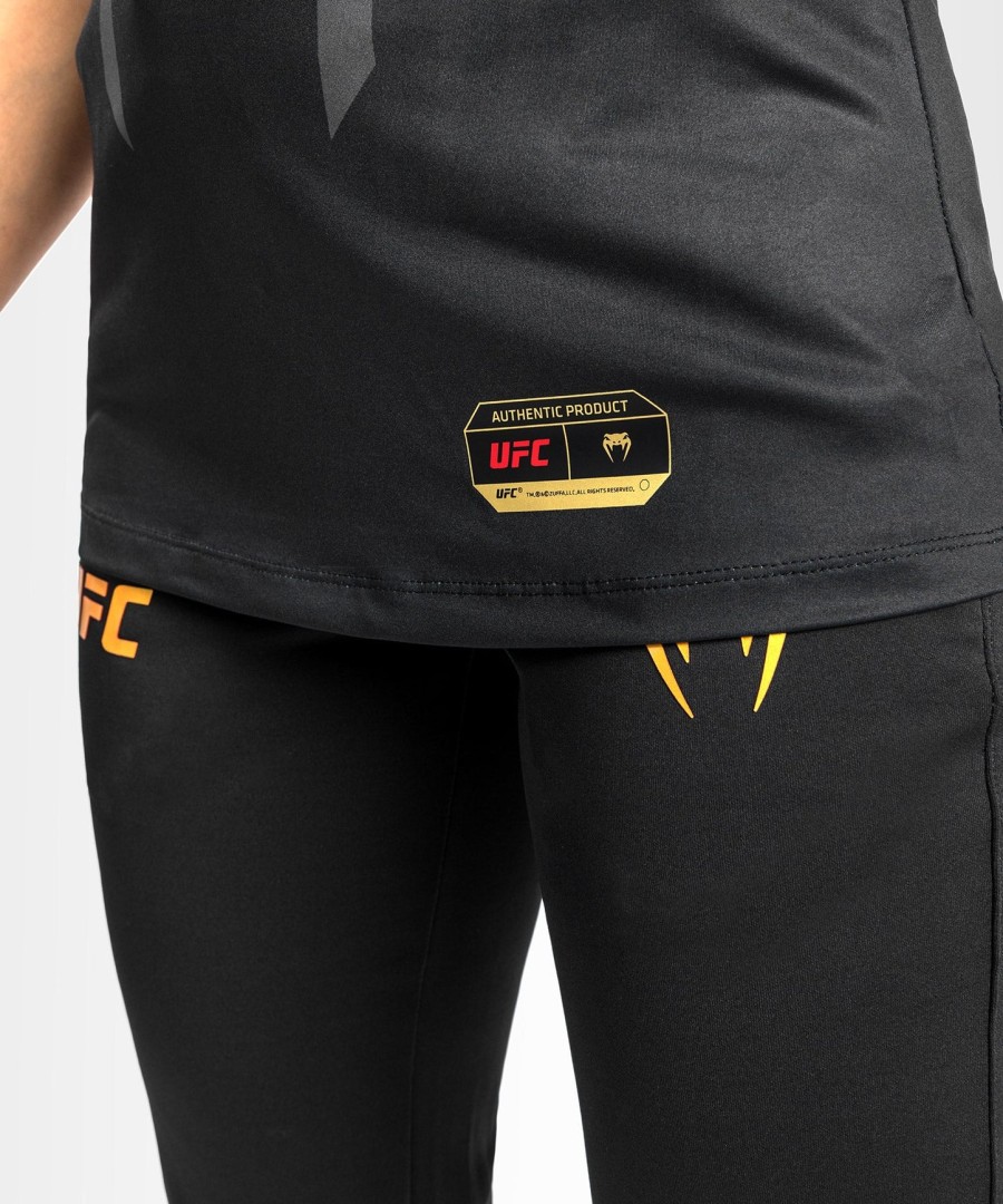 uniforme autêntico ufc venum fight night 2.0 da venum - camisa de entrada feminina - campeã