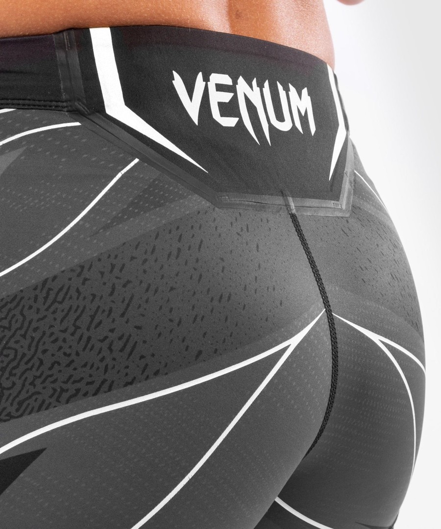 shorts ufc venum authentic fight night feminino vale tudo - corte curto - preto