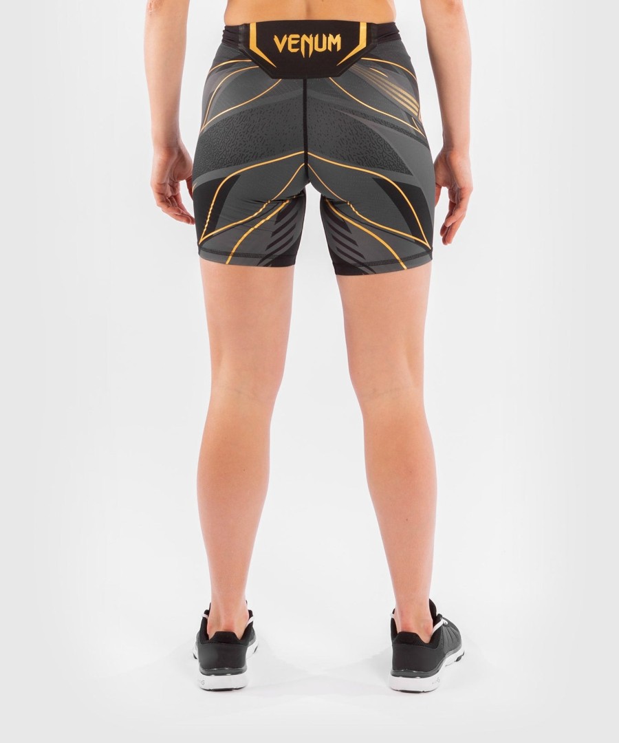 shorts ufc venum authentic fight night feminino vale tudo - comprimento longo - champion