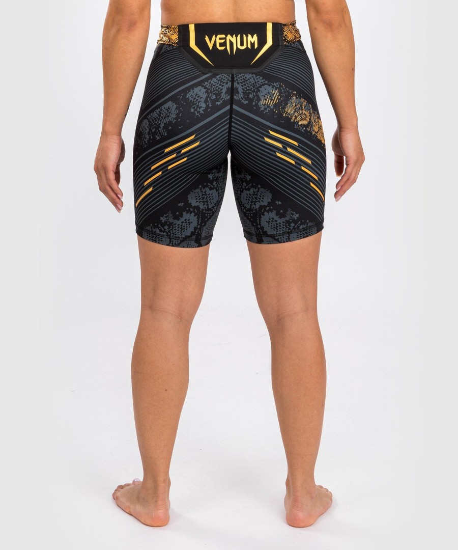ufc adrenaline by venum authentic fight night feminino vale tudo short - long fit - campeão