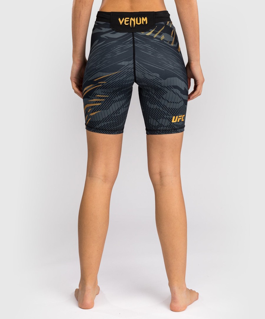 ufc fusion by venum authentic fight night feminino vale tudo short - long fit - campeão
