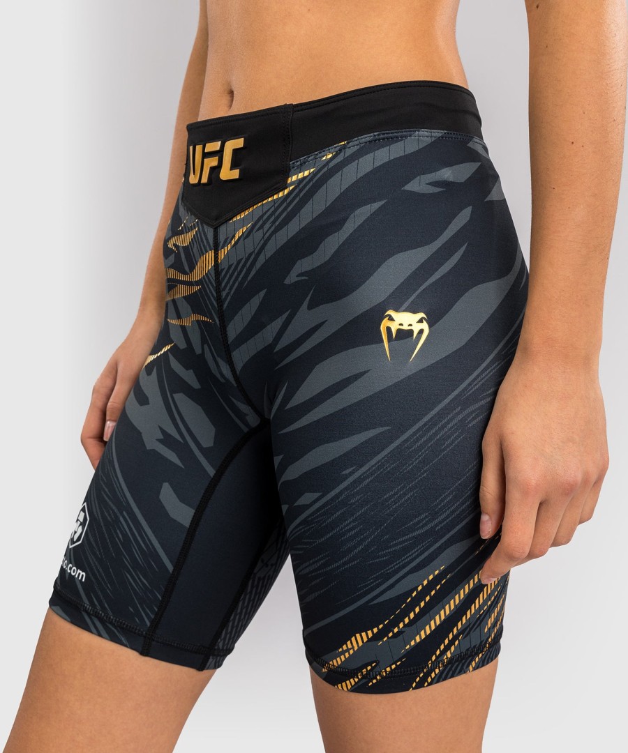 ufc fusion by venum authentic fight night feminino vale tudo short - long fit - campeão