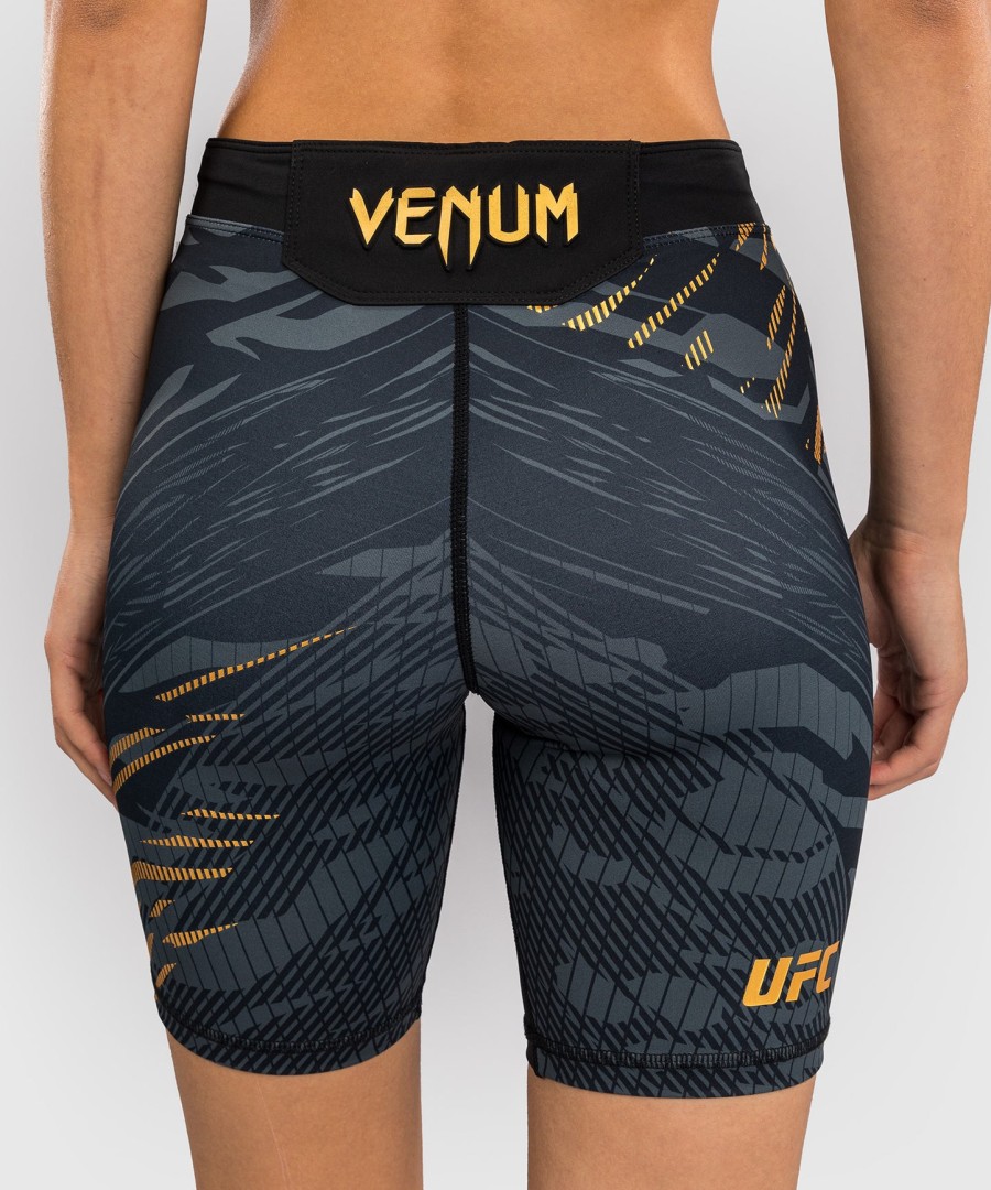 ufc fusion by venum authentic fight night feminino vale tudo short - long fit - campeão