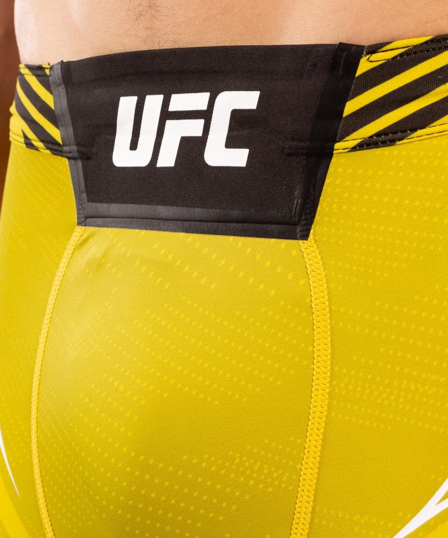 shorts ufc venum authentic fight night masculino vale tudo - corte curto - amarelo