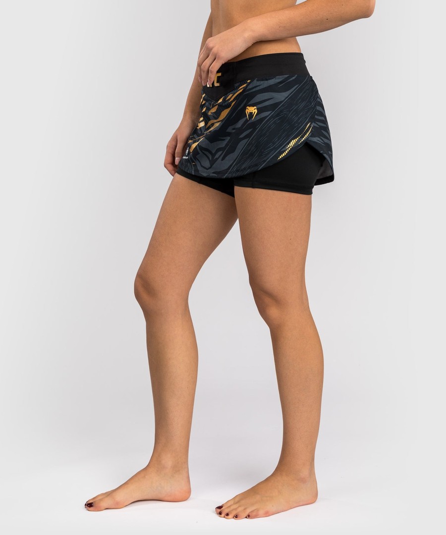 saia-calça feminina ufc fusion by venum authentic fight night - campeã