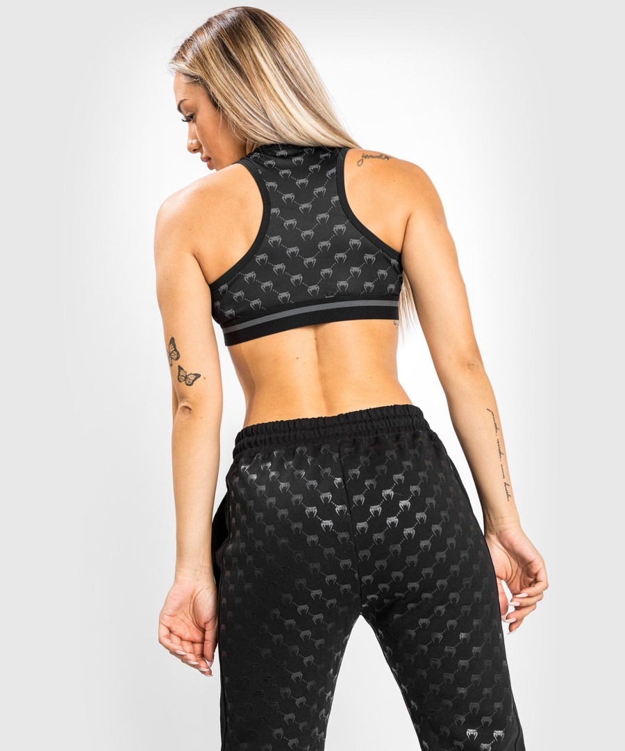 calça jogger venum monogram - feminina - pretorosa dourado