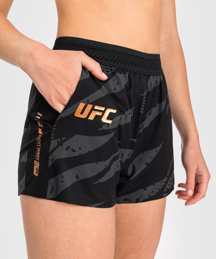 short de performance feminina ufc adrenaline by venum fight week - camuflagem urbana